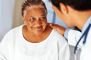 Elderly Woman with Therapist